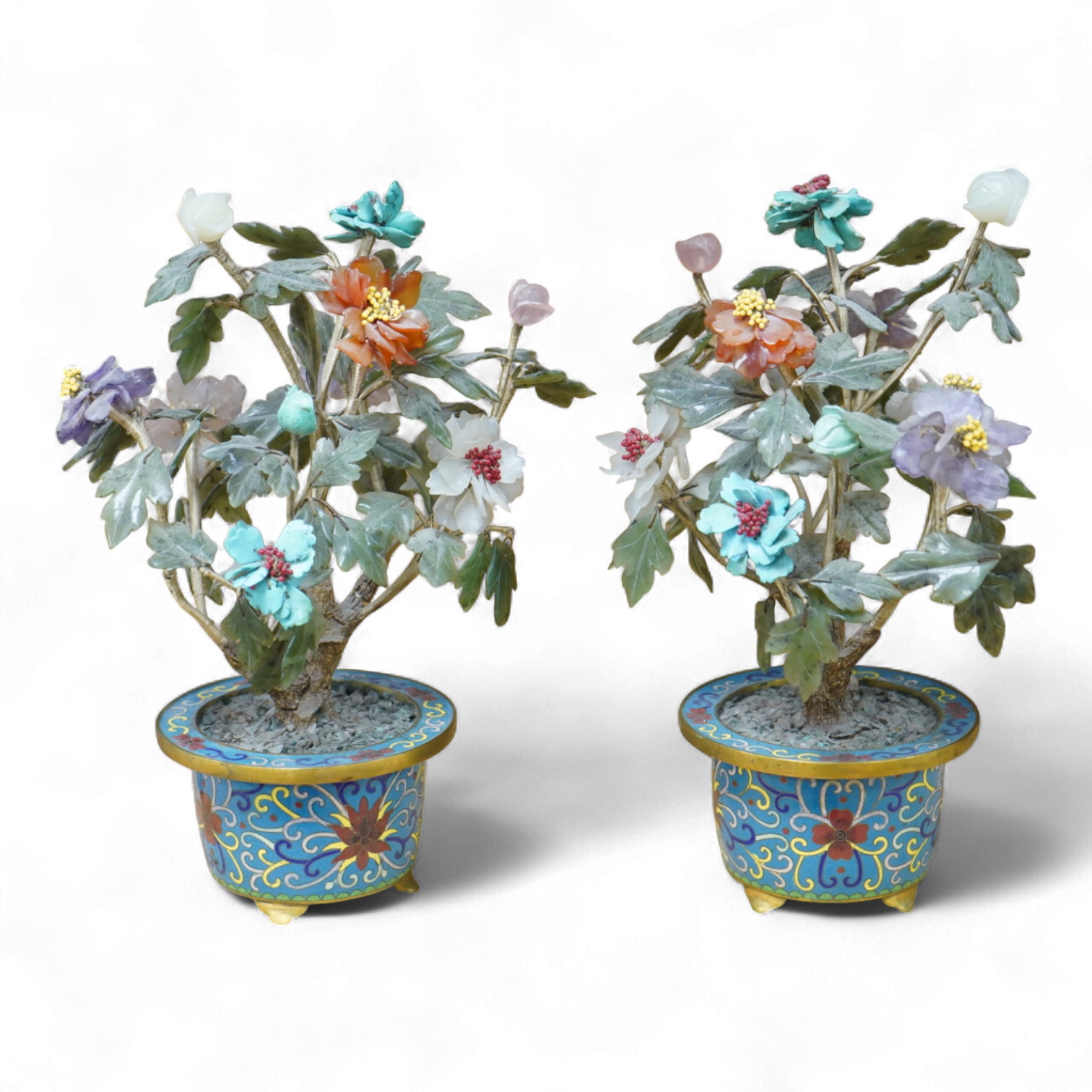 A pair of Chinese hardstone trees, in cloisonne jardinieres, 23cm high
